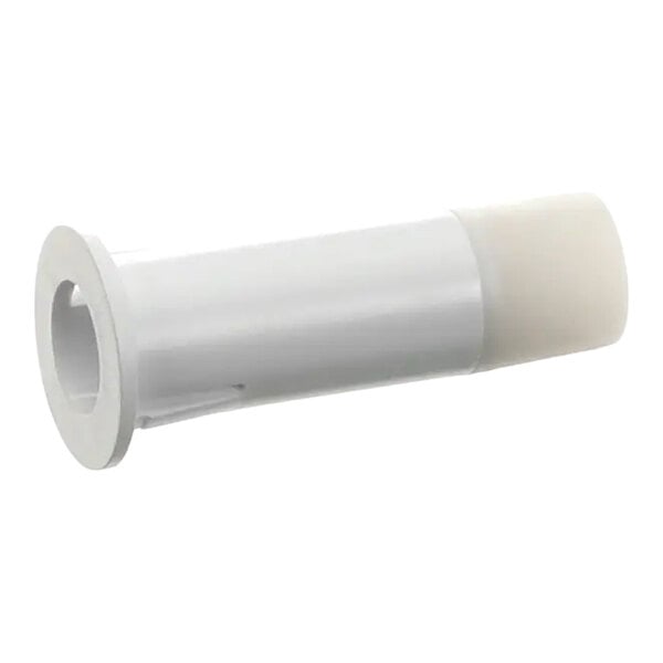 A white plastic guide harvest assist part for an Ice-O-Matic ice machine.