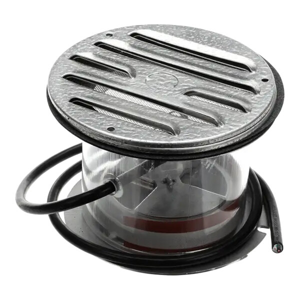 A round metal ventilator with a grated cover, attached wiring, and a 4-inch diameter for wall installation.
