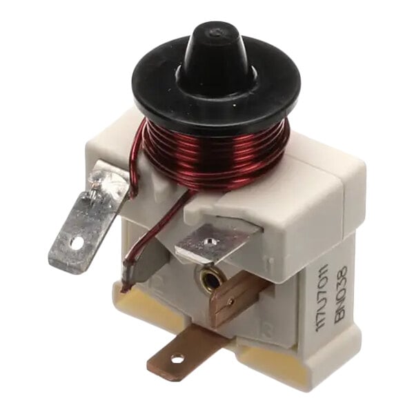 A compact electrical relay with a coil of red wire, metal terminals, and a plastic housing.