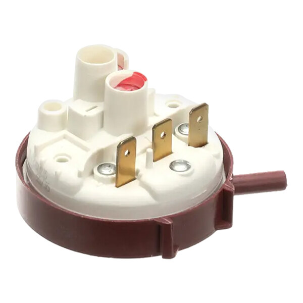 A round, plastic pressure switch with three metal terminals and a side nozzle, used in commercial appliances.
