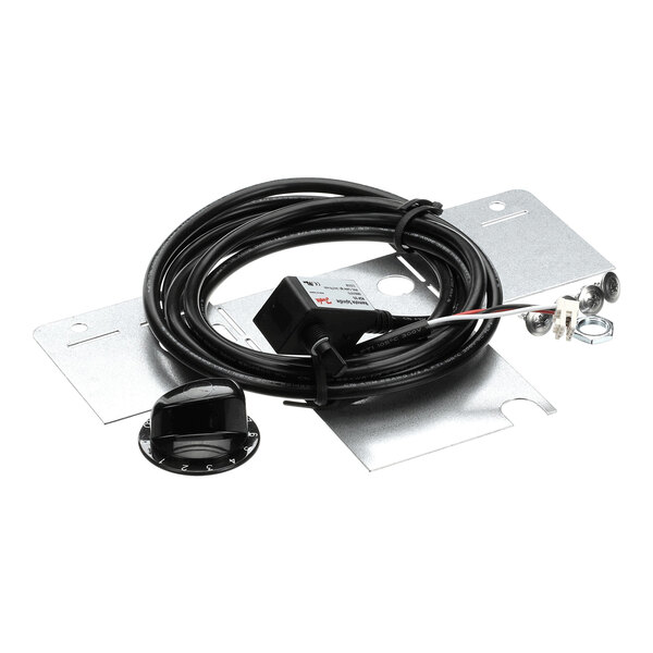 A retrofit kit for a Traulsen refrigeration unit, including a control knob, wiring, and mounting hardware.