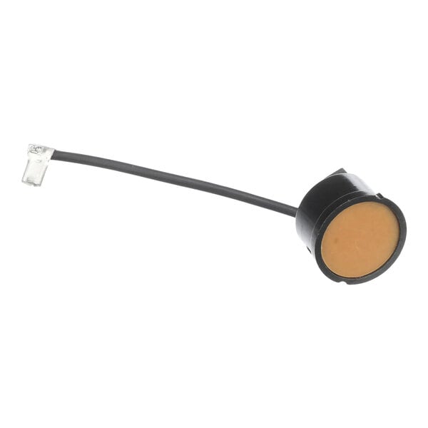 An electrical overload protector component with a black wire and connector, used for Tecumseh compressors.