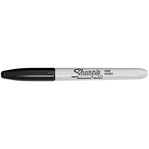 A black fine point Sharpie permanent marker with a gray barrel and black cap.