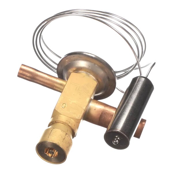 A brass thermostatic expansion valve with attached capillary tube and bulb for refrigeration systems.