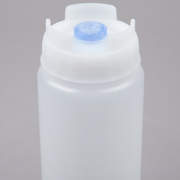 A translucent 16 oz. squeeze bottle with a thick dispensing valve and a white cap.