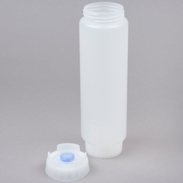 A translucent 16 oz. squeeze bottle with a thick dispensing valve and a removable cap.