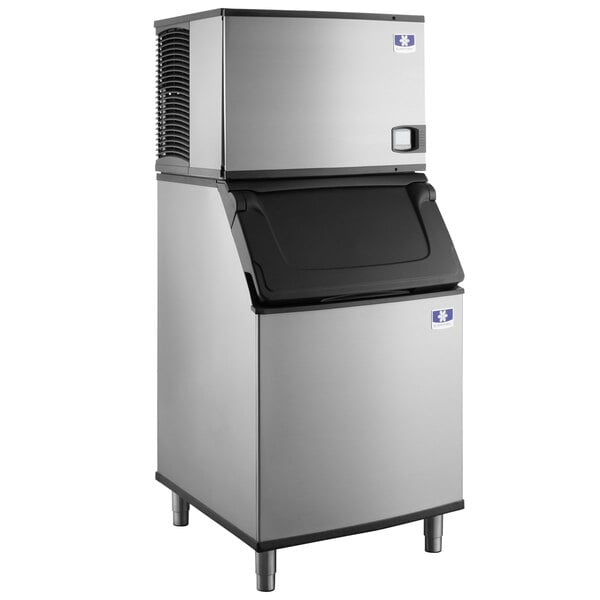 A commercial stainless steel ice machine with a large storage bin.
