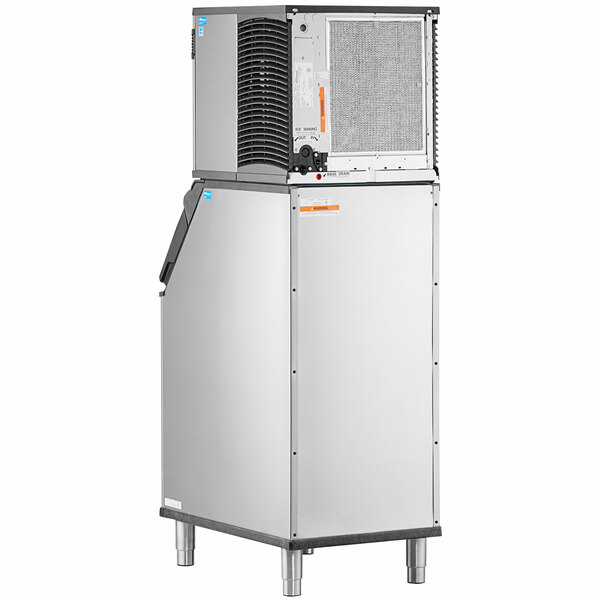 A commercial stainless steel ice machine with an air-cooled unit and a large storage bin.