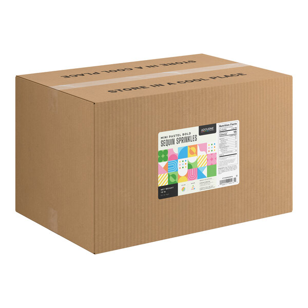 A large brown cardboard box with a colorful label indicating it contains mini pastel sequin sprinkles.