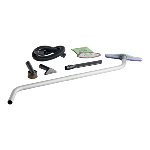 A cordless backpack vacuum accessory kit including a hose, wand, various nozzles, a brush, and a vacuum bag.