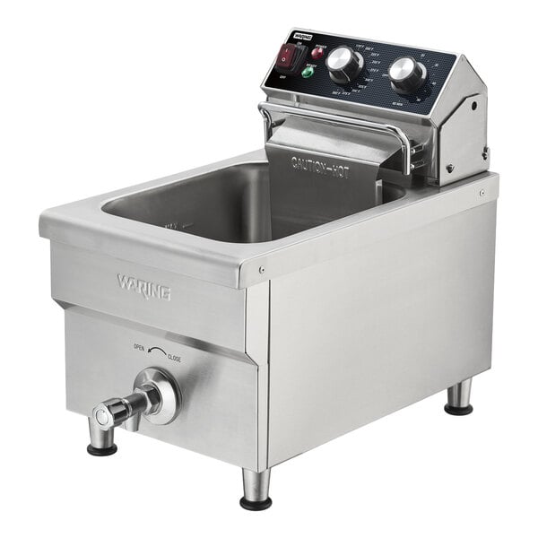 A stainless steel heavy-duty commercial countertop deep fryer with control knobs and a front drain valve.