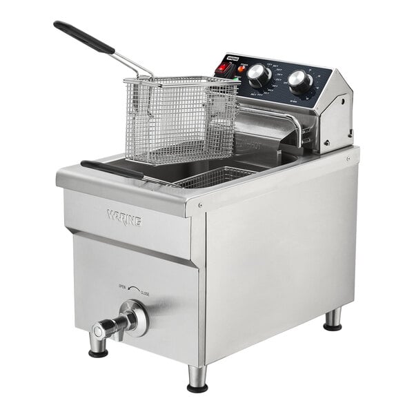 A stainless steel commercial countertop deep fryer with a control panel, fryer basket, and oil drain spout.
