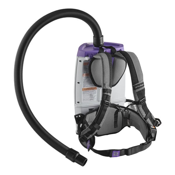 A backpack vacuum cleaner with padded shoulder straps and a flexible hose attachment.