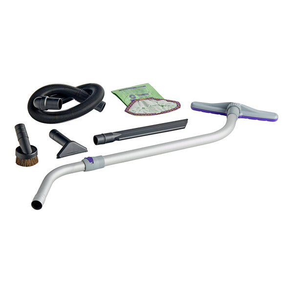 A cordless backpack vacuum accessory kit including a telescoping wand, hose, various nozzles, a dusting brush, and a vacuum bag.