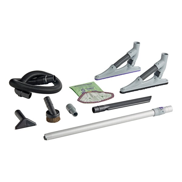 A ProTeam GoFit 6 cordless backpack vacuum kit with various attachments, including hoses, wands, brushes, and vacuum bags.