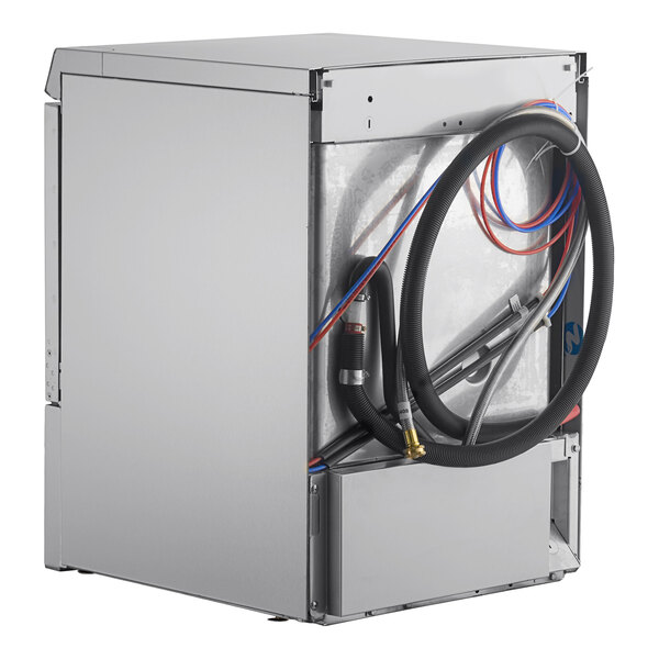 A commercial undercounter dishwasher with hoses and wiring visible on the back panel.