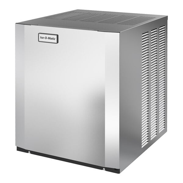 An industrial stainless steel ice machine with air vents on the side and a front-facing Ice-O-Matic logo.