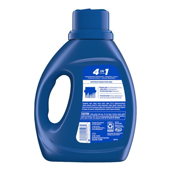 A blue plastic bottle of Purex Fresh Mountain Breeze liquid laundry detergent.