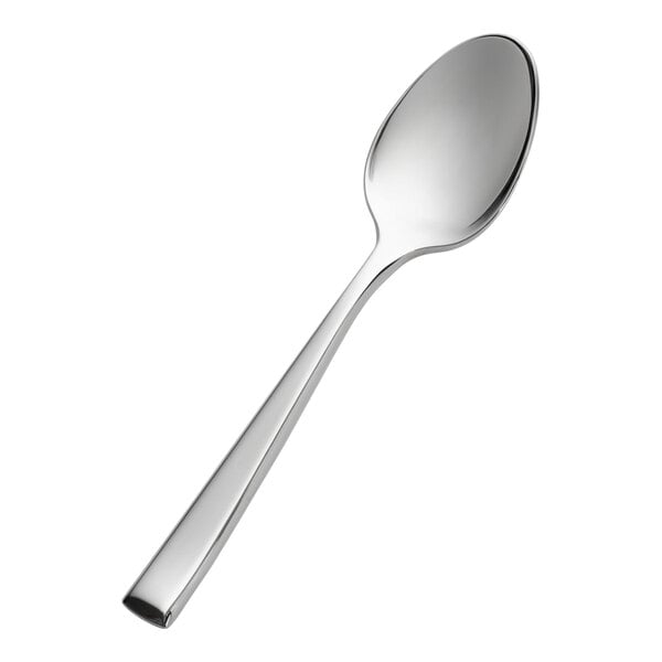 A stainless steel demitasse spoon with a polished finish and a simple, modern design.
