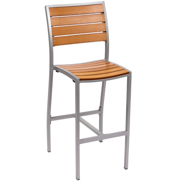 A BFM Seating bar stool with a synthetic teak seat and metal frame.