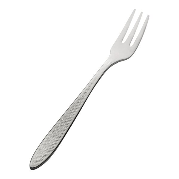 An extra heavy weight stainless steel oyster or cocktail fork with a textured handle.