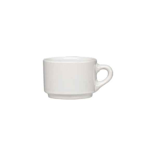 A small white stoneware espresso cup with a handle.