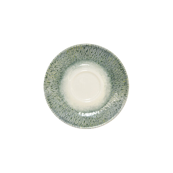 A small green and white china saucer with a textured pattern around the rim.