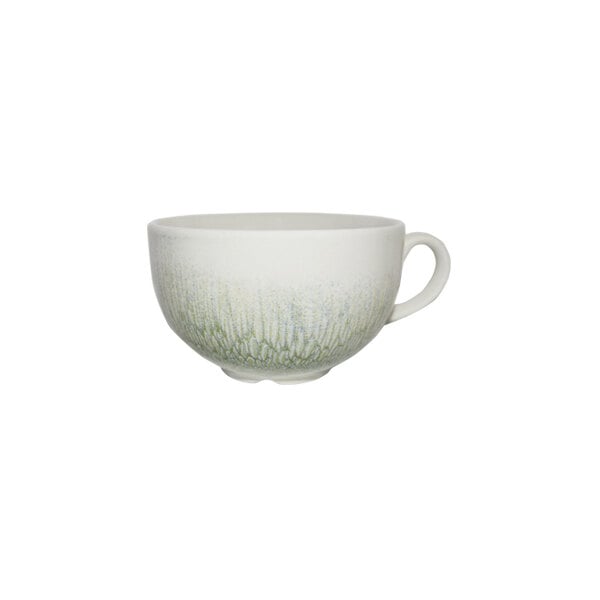 A white and green ceramic coffee cup with a handle.