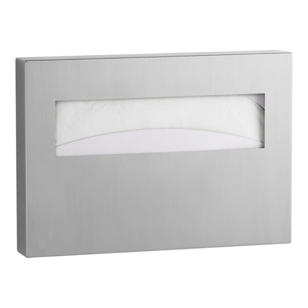 A rectangular, surface-mounted stainless steel seat cover dispenser with a satin finish and a horizontal opening for dispensing covers.