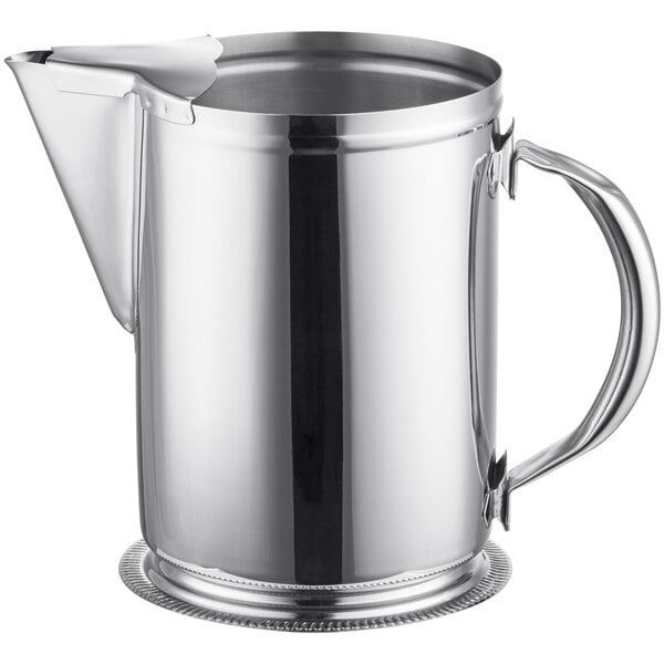 A stainless steel beverage pitcher with an ice guard and a handle.