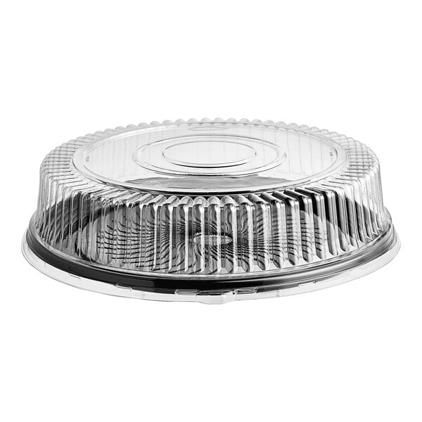 A clear, round, ribbed plastic dome lid attached to a black circular tray.