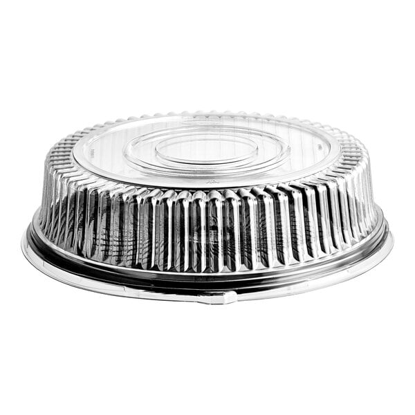 A clear, round, ribbed plastic dome lid securely covering a black circular tray.