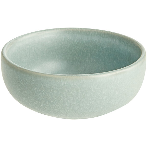 A small, round, light blue bowl with a matte finish.