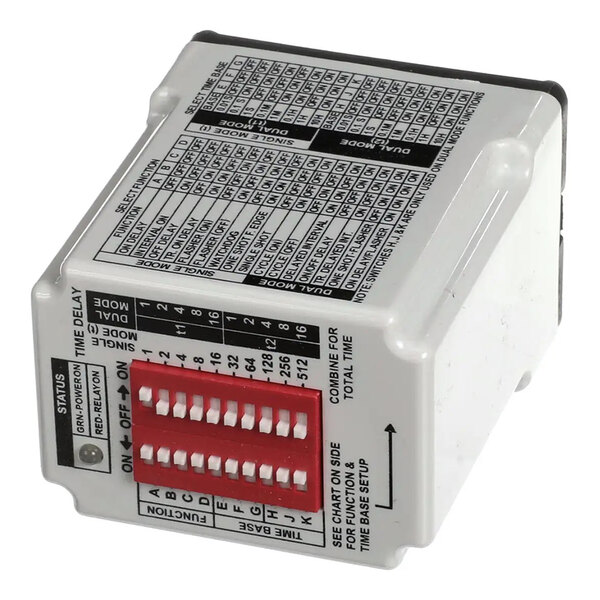 A Carter-Hoffmann time delay relay with a labeled chart and red DIP switches for configuration.