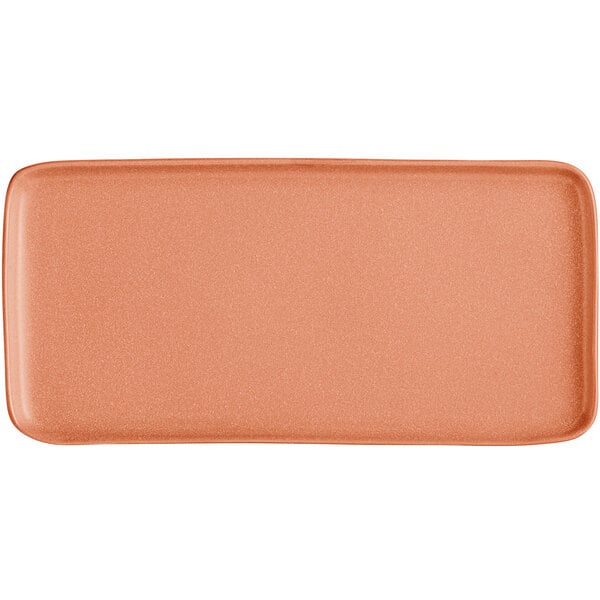 A rectangular, matte, terra cotta-colored platter with rounded edges.