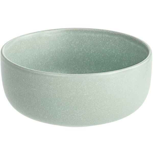 A simple, round, matte light blue bowl with a smooth finish.