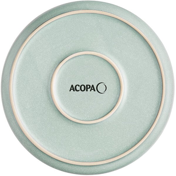 A round, matte blue plate with a subtle speckled texture and the word 'ACOPA' printed in the center.