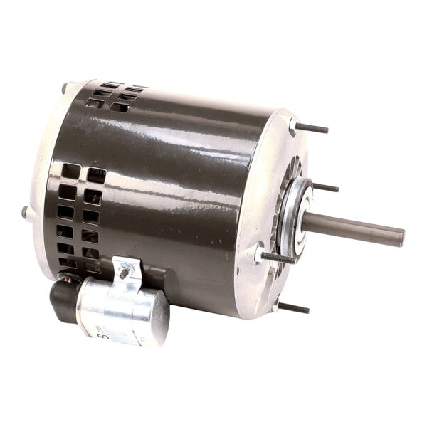A cylindrical electric motor with a metal housing, ventilation slots, and an attached capacitor.