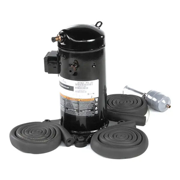 A Cornelius Viper compressor kit with a cylindrical black compressor unit, rubber mounting pads, and an additional metal component.
