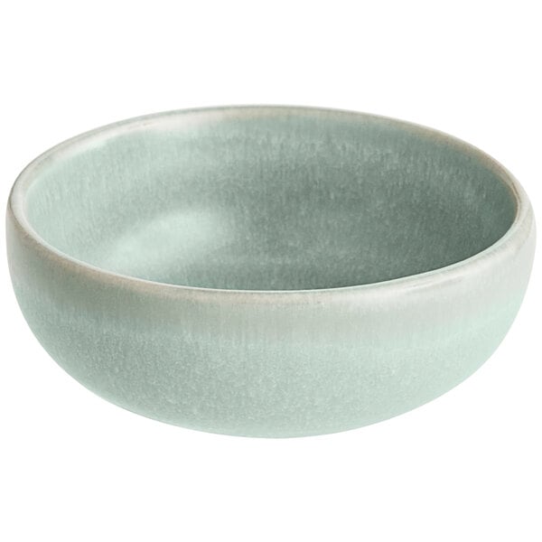 A small, round, light blue bowl with a matte finish.