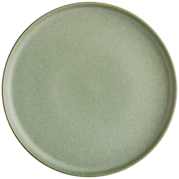 A round, sage green matte plate with a smooth, slightly raised rim.