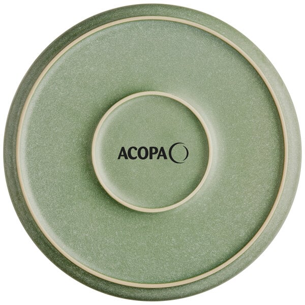 A round, sage green plate with a matte finish and the word 'ACOPA' printed in black on the bottom center.