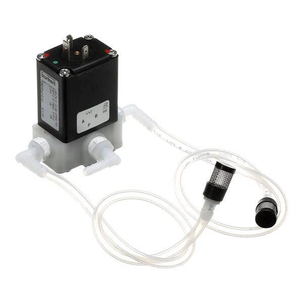 An assembly for alternative milk dispensing, featuring a solenoid valve with attached tubing and connectors.