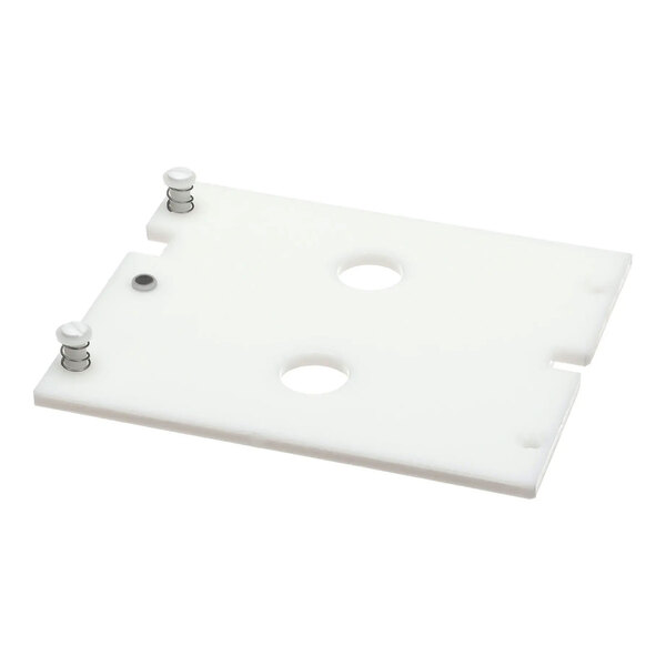 A small white assembly weight tray with two circular holes and two spring-loaded pins, used in Concordia Beverage Systems.