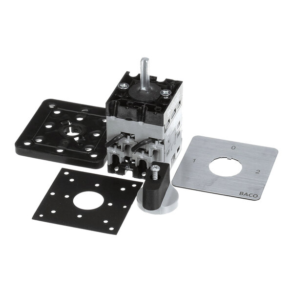 A reversing switch assembly with multiple mounting plates and a rotary knob.