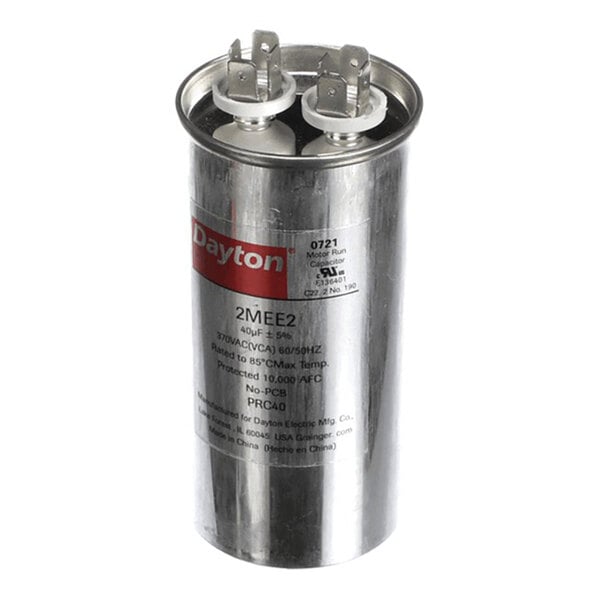 A clear acrylic cake or pie cover with a metal handle, measuring 12 inches by 4 inches.