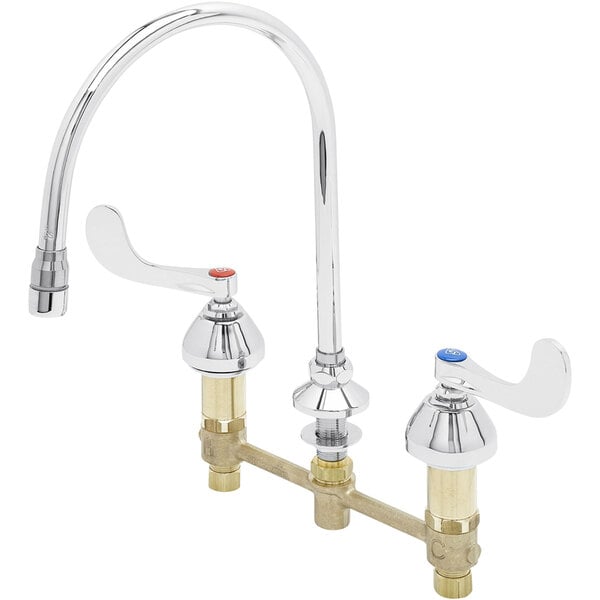 A chrome T&amp;S deck mount faucet with two wrist action handles and a gooseneck spout.