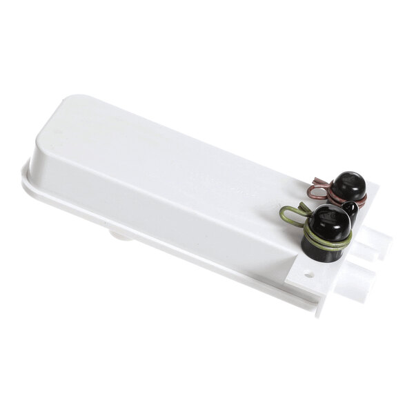 A white International Comfort Products 1171917 trap drain with two black caps secured by colored bands.