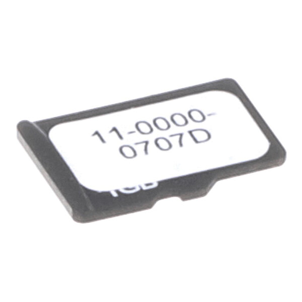 A small rectangular SD card labeled with a part number and used for firmware assembly.