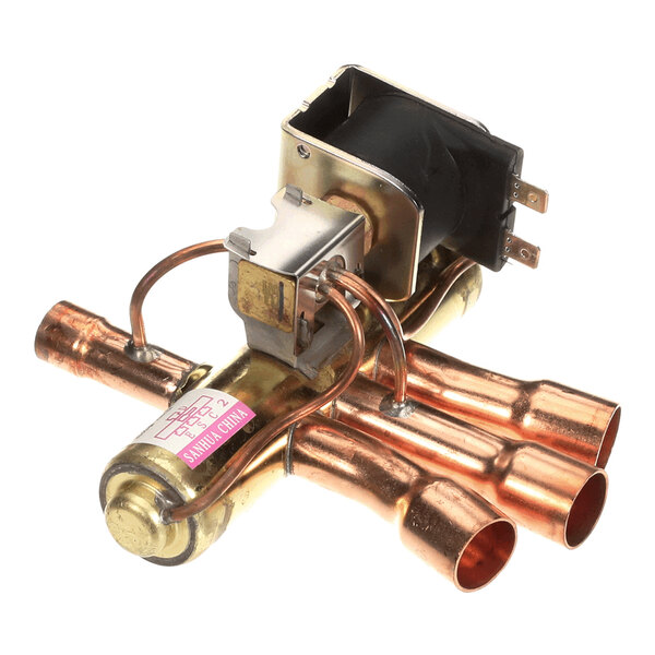 A copper and metal reversing valve for HVAC systems.